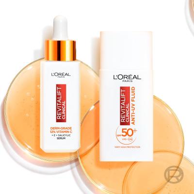 L&#039;Oréal Paris Revitalift Clinical Pure 12% Vitamin C Darčeková kazeta sérum Revitalift Clinical Vitamin C Serum 30 ml + denný pleťový krém Revitalift Clinical Vitamin C Anti-UV Fluid SPF50 50 ml